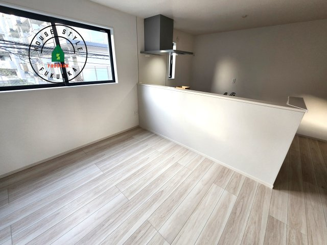 福岡市中央区港3丁目第1-1棟（1号棟）の内観：施工例|キッチンから立ち込める香りが今日の料理を期待させます。