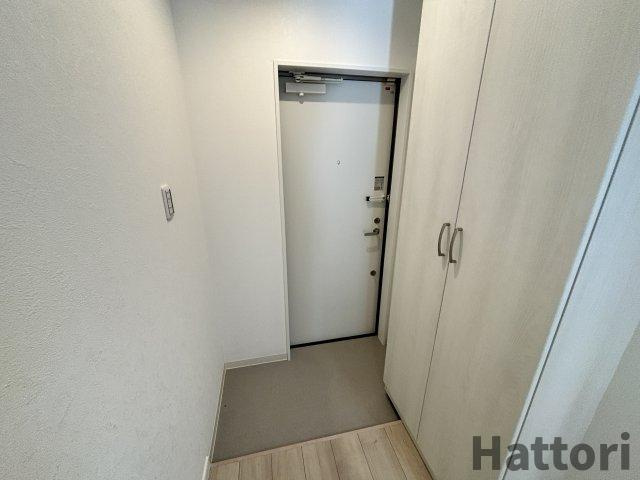 プルメリア阪大前の玄関