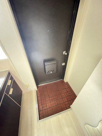 大阪市都島区都島中通１丁目の賃貸マンションの玄関