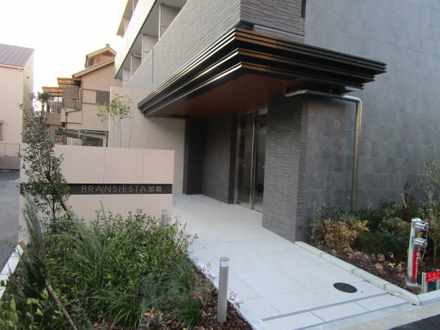 大阪市淀川区加島３丁目の賃貸マンションのエントランス