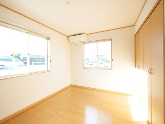 ラディッシュタウン撫川 壱番館の寝室