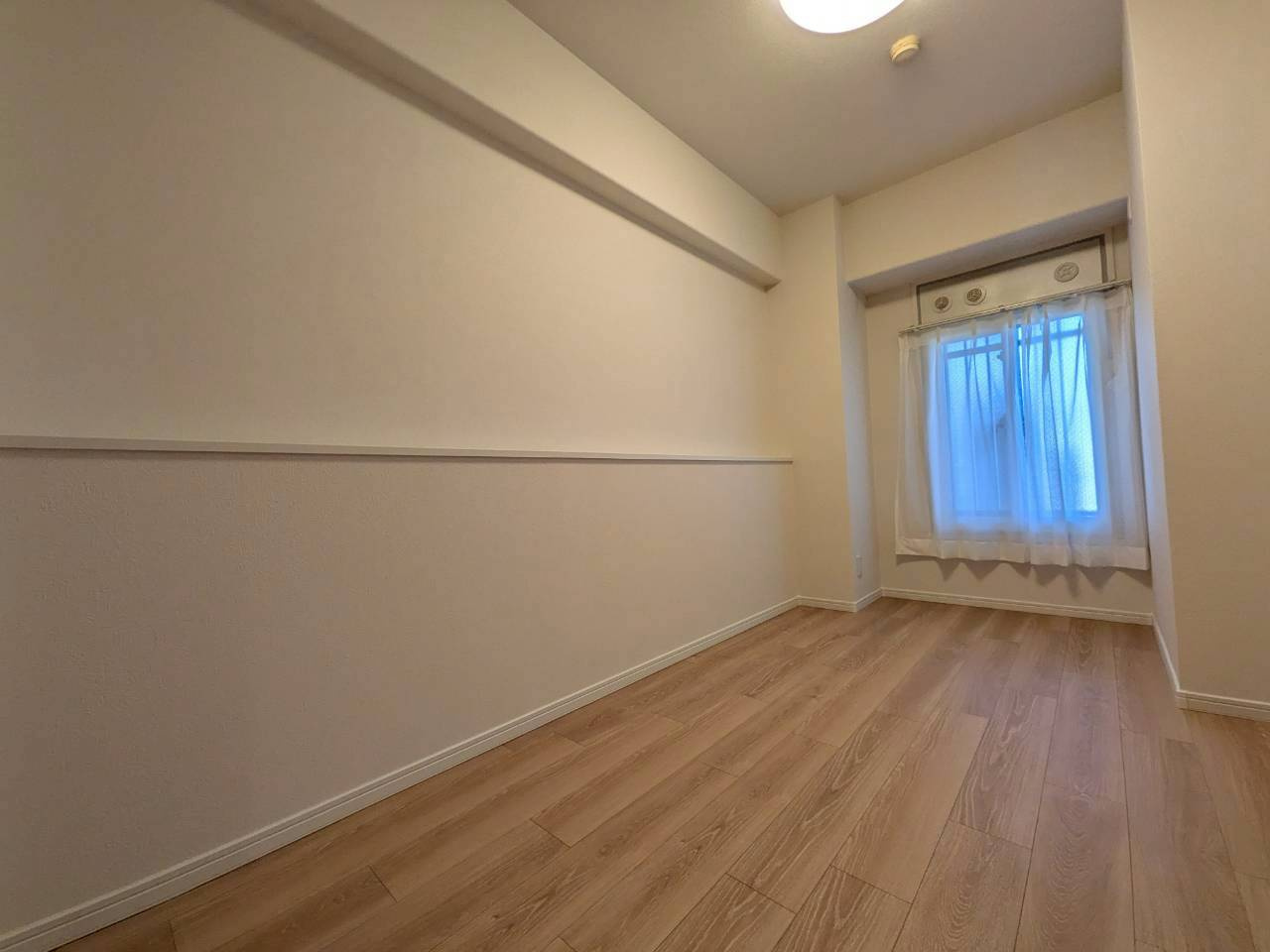 南林間ハイライズの洋室