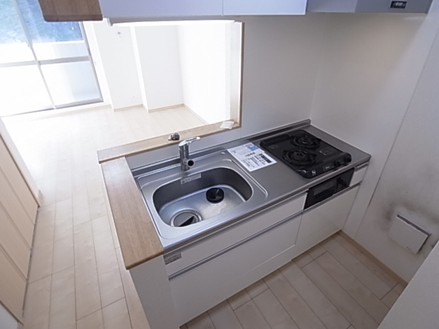 神戸市須磨区衣掛町４丁目の賃貸マンションのキッチン|システムキッチン（ガス２口）
