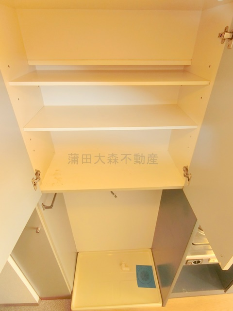 ステージ新蒲田の設備|室内洗濯機置場と吊り棚