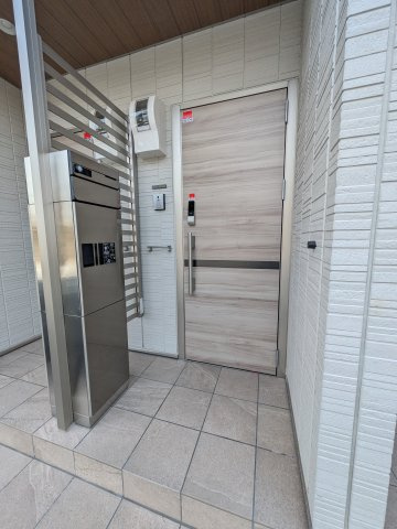 グリーンメゾン柴崎のエントランス