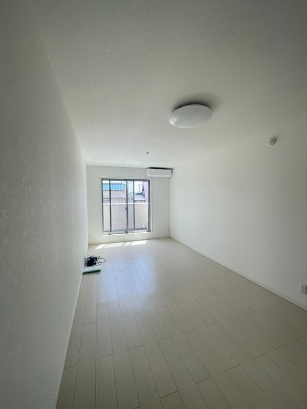 ワコーレヴィアーノ須磨千守町の居間・リビング