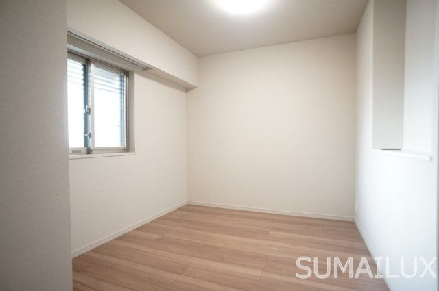 熊本市中央区西阿弥陀寺町の賃貸マンションの洋室