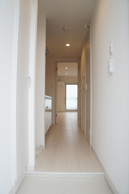 リブリ・コンフォート ホウデンの玄関