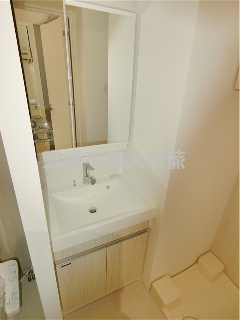 REALIZE蒲田Ⅱの洗面所|洗面脱衣所　2面鏡の独立洗面台　洗濯機置き場