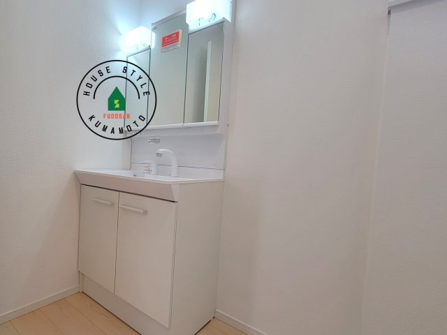 合志市栄第6-1棟(1号棟)の内観：施工例|洗面所は小さなプライベートスペース。歯磨き、洗顔と毎日施す個人空間。