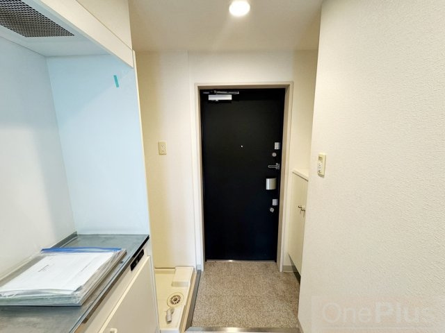 ライジングコート深江本町フラワーパークの玄関