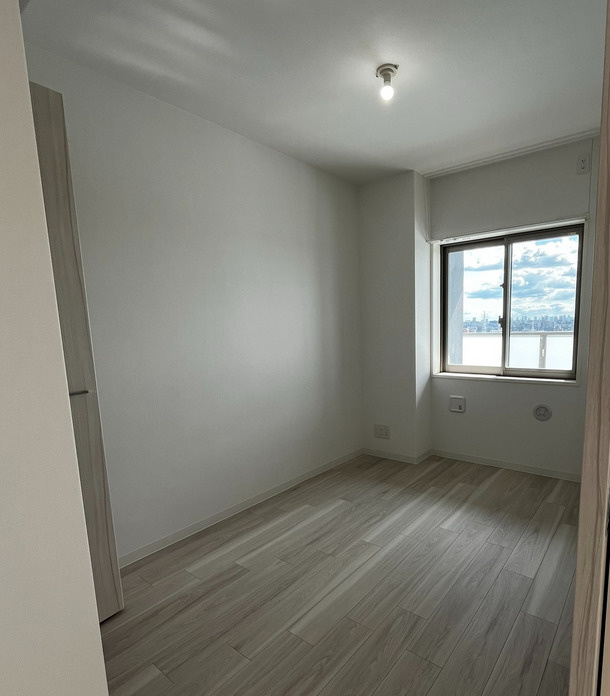 アーバンパーク谷在家の寝室