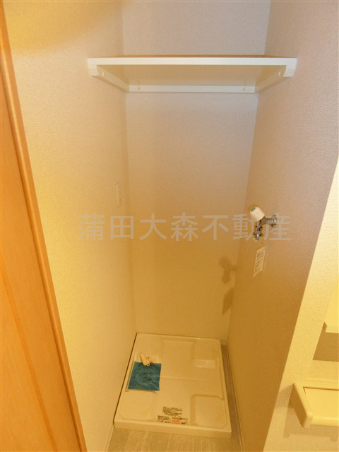第一デュオレスズエの設備|棚付きの室内洗濯機置き場