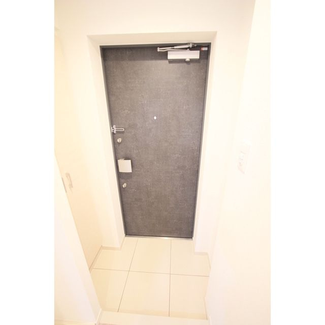 中央区月島３丁目の賃貸マンションの玄関