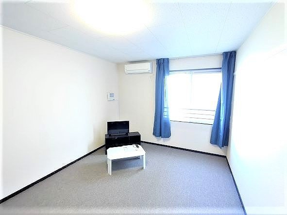 レオネクストＴｏｍａⅠの居間・リビング