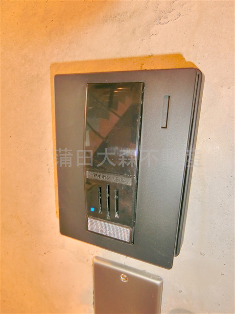 ロータス平和島Westウエストの玄関