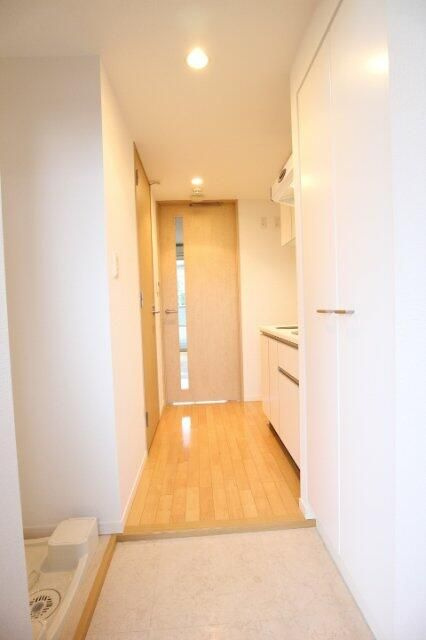 プラウドフラット王子神谷の玄関