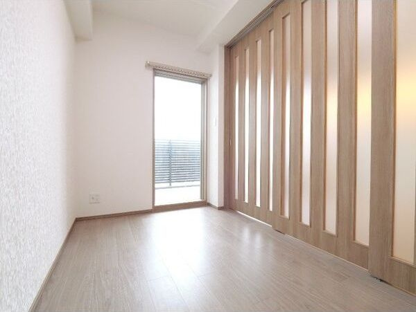 プレジオ西中島ASIANの寝室