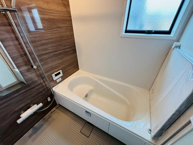 タマタウン　瑞穂市本田（本田小Ⅱ）　全3区画分譲の浴室|雨天時の洗濯物も安心な換気暖房乾燥機も完備。お子さまやお年寄りが入浴しやすい、あんしん設計です。