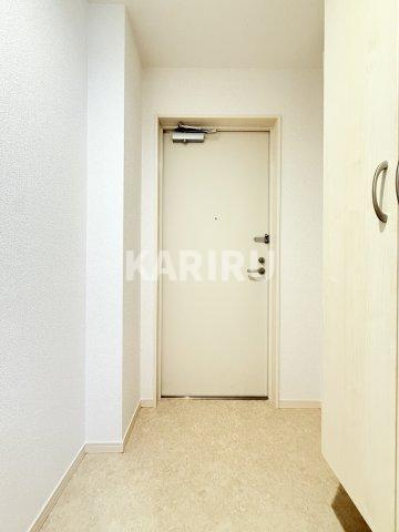 アルカンシェルコート緑橋の玄関