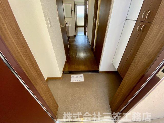 枚方市楠葉並木２丁目の賃貸マンションの玄関