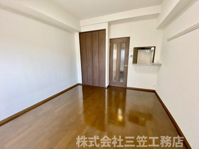 枚方市楠葉並木２丁目の賃貸マンションの寝室