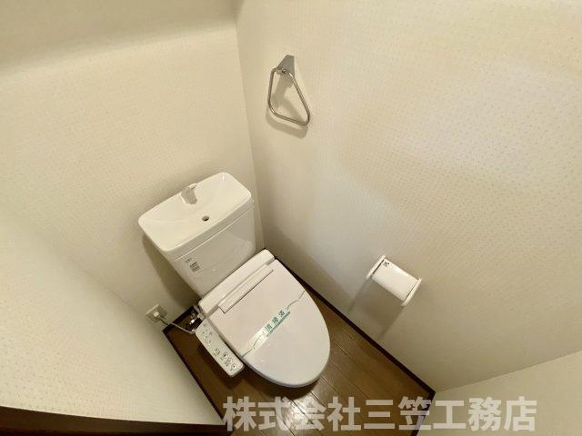 枚方市楠葉並木２丁目の賃貸マンションのトイレ