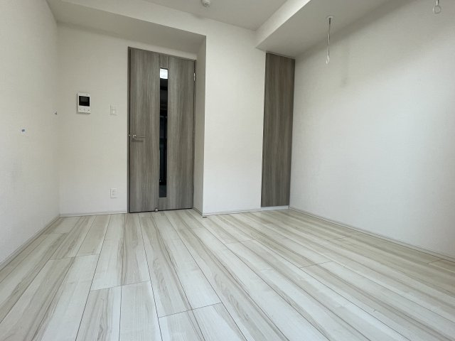 稲城市東長沼の賃貸マンションの居間・リビング