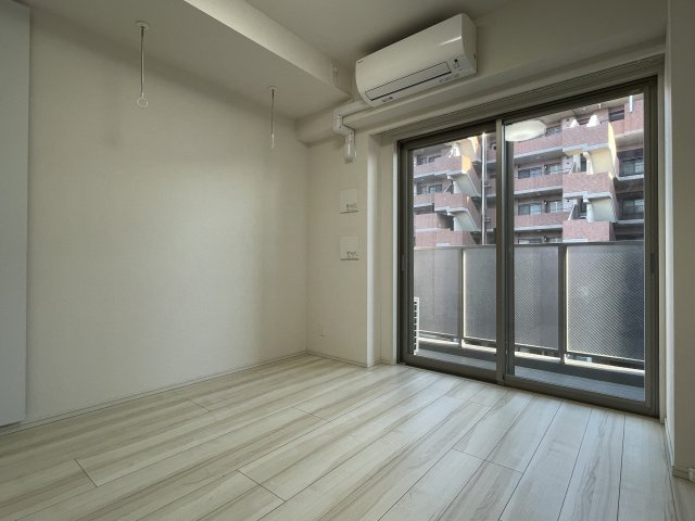 稲城市東長沼の賃貸マンションの居間・リビング