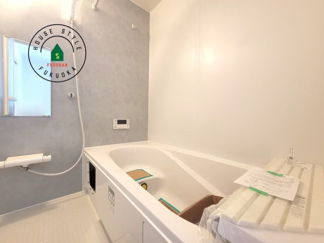 那珂川市今光8丁目第3-2棟（1号棟）の内観：施工例|1日の疲れを癒してくれる広々バスルーム。雨の日のお洗濯にも大活躍な浴室乾燥機付です！