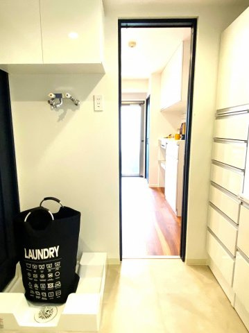 ライオンズステーションプラザ入谷　10Fのランドリースペース