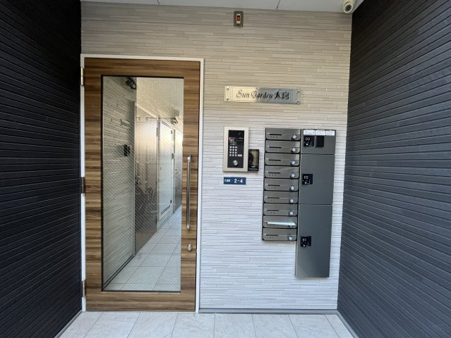 泉佐野市大宮町アパート　Sun　Gardenの防犯設備|オートロック、宅配ロッカー