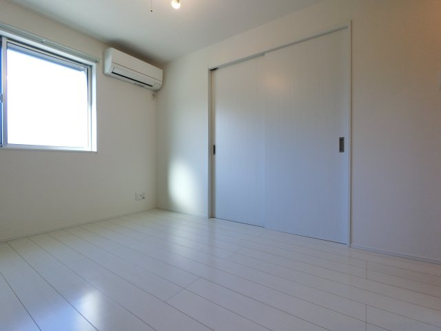 Lyk都町A棟の居間・リビング