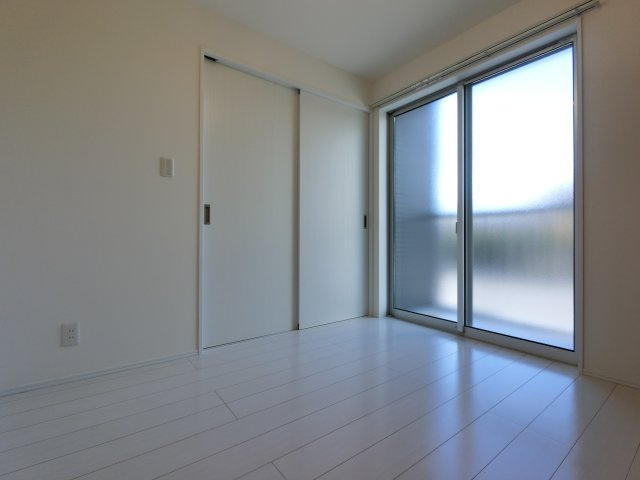 Lyk都町A棟の洋室