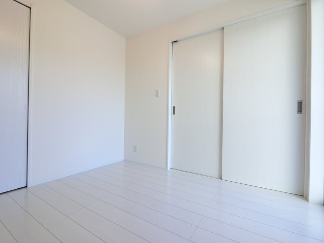 Lyk都町A棟の洋室