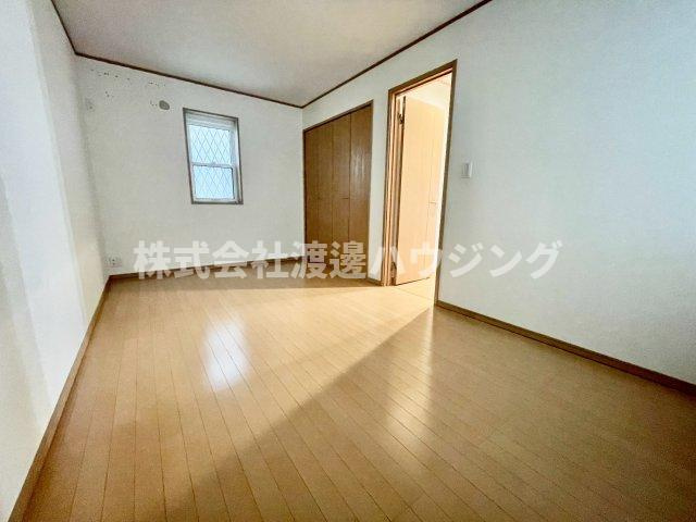 老松町貸家の寝室