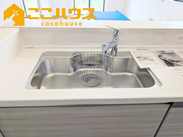 豊見城市渡橋名浜原　新築戸建て　全39区画　26号棟のキッチン|洗い物のしやすいワイドシンク