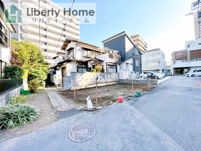 松戸市根本　建築条件付売地の前面道路含む現地写真