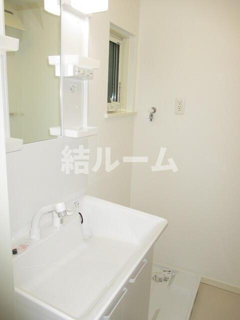 豊島区千川１丁目のアパートの洗面所