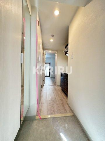 ファーストフィオーレ京橋ノワールの玄関