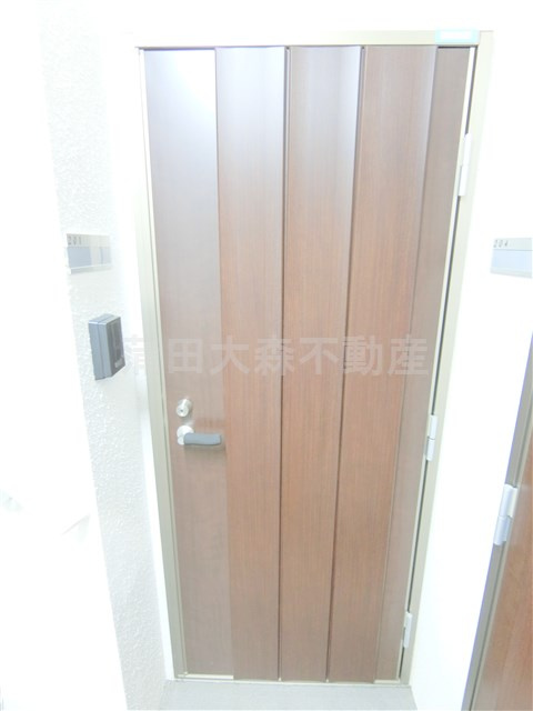 シャンテ西六郷の玄関