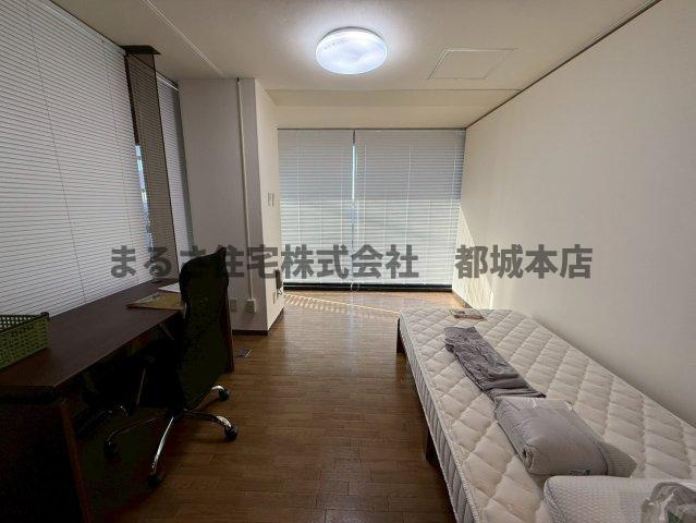 コウガユウキビル店舗（マンスリー）の洋室