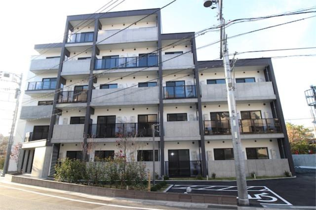 川崎市麻生区上麻生３丁目の賃貸マンションの外観