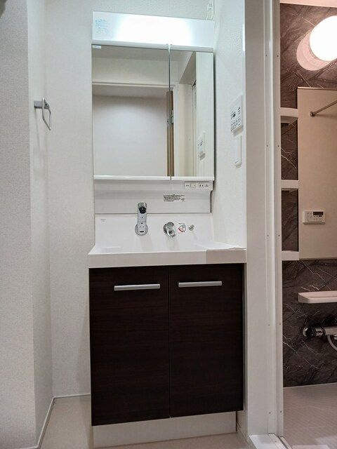 Ｋ．Ｉ．Ａ．Ｌ　東合川ヴィラの洗面所|コンパクトで使いやすい洗面所