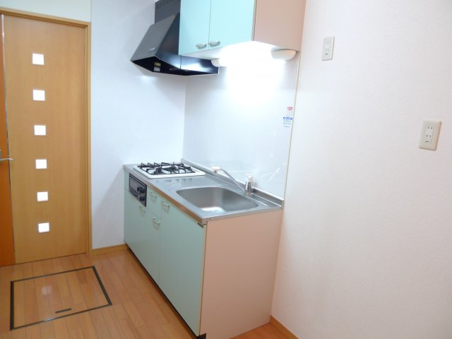 メルローズプレイスⅡのキッチン|２口コンロシステムキッチンでお料理もらくらくですね※お部屋は別のお部屋です