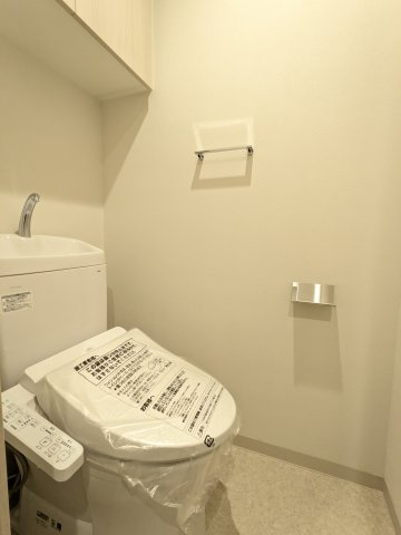 ジェイアール稲毛駅前レジデンスのトイレ|落ち着いた色調のトイレです