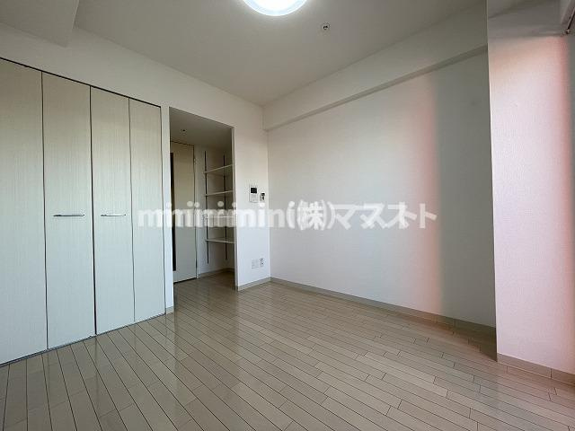 エステムプラザ難波ＷＥＳＴリバークロスの洋室