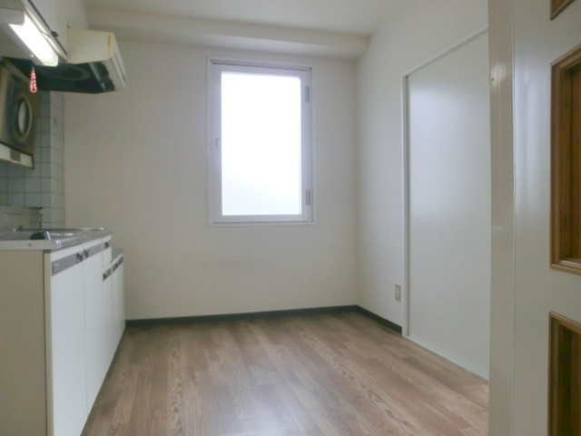 プチメゾントシの居間・リビング|キッチンスペース。