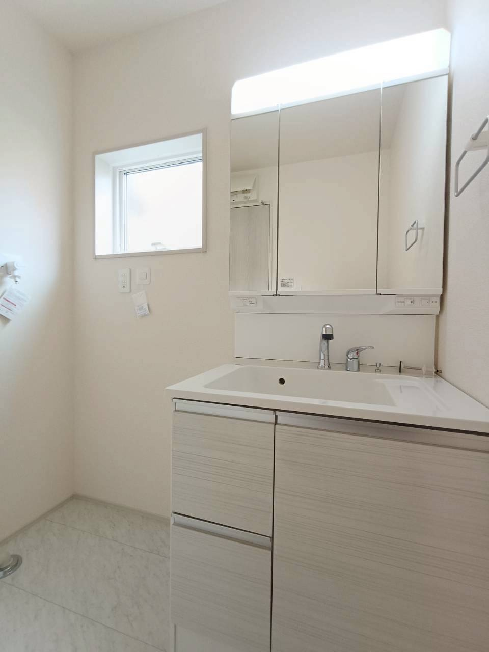 八潮市　大瀬　新築戸建　全1棟の洗面所|施工例です