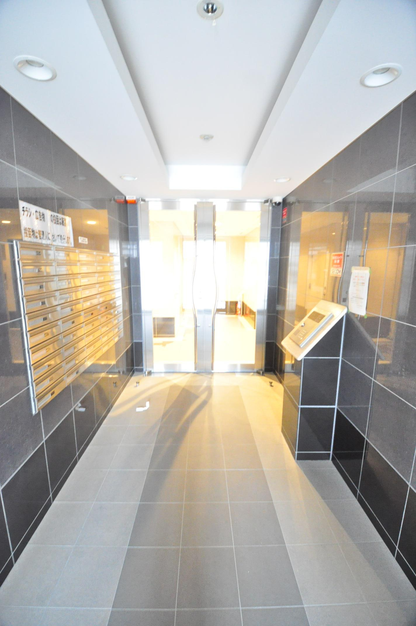 大阪市都島区高倉町１丁目の賃貸マンションのエントランス